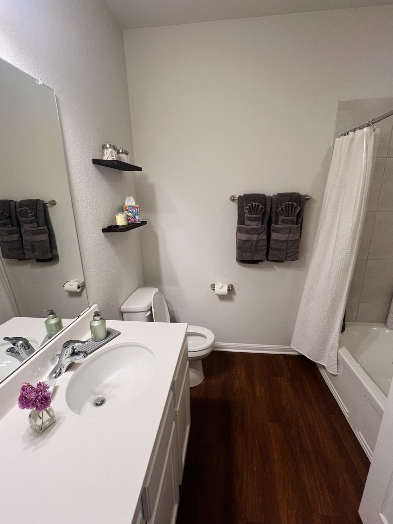 Clean, tidy bathroom with neatly folded towels