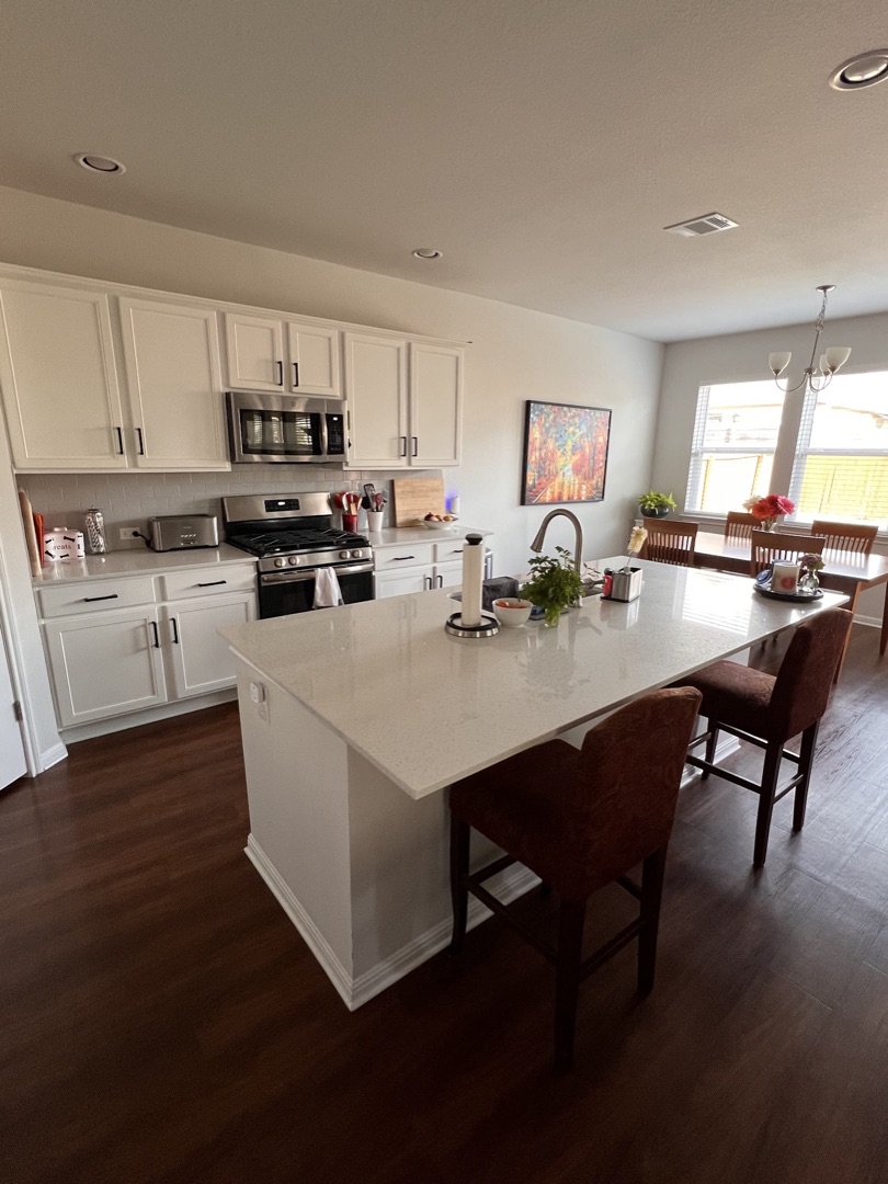 Spotless kitchen with clean countertops and island
