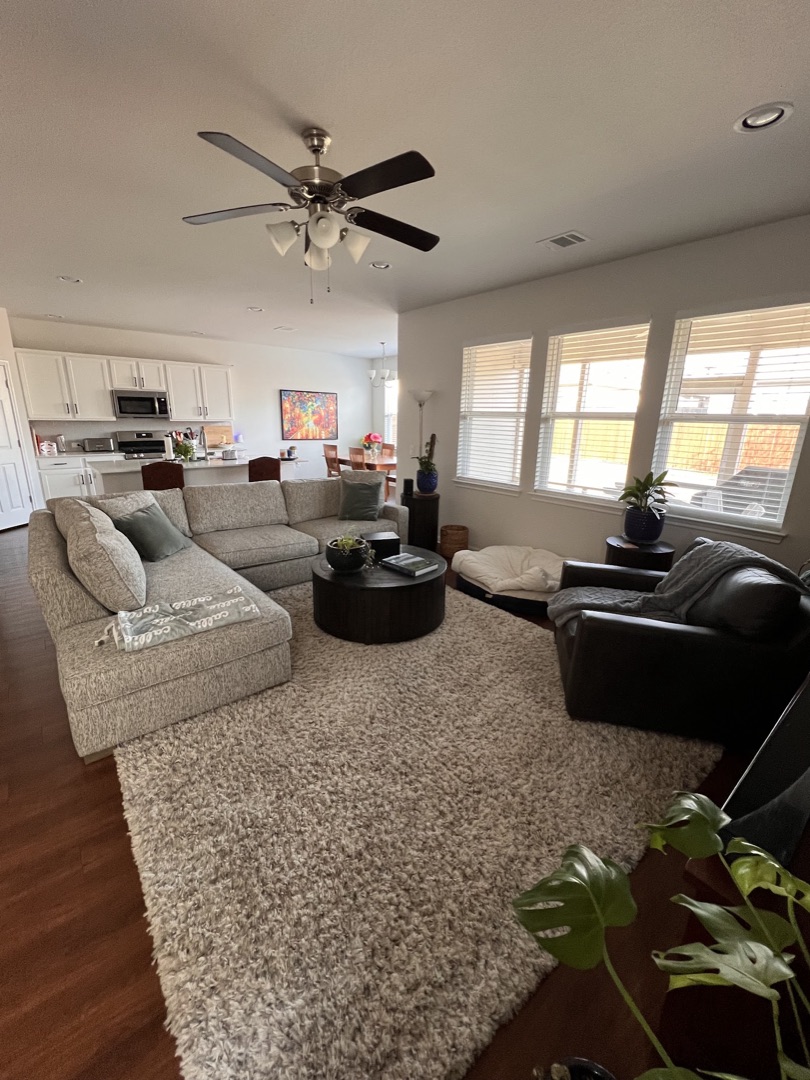 Freshly cleaned open-plan living room in a Pflugerville home